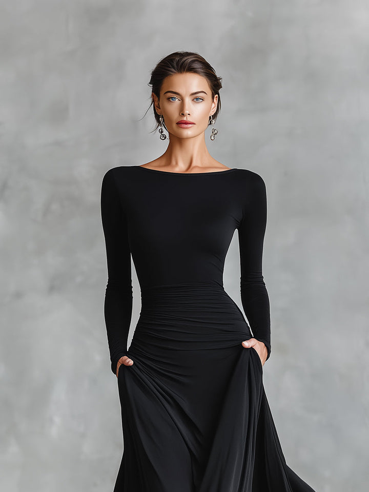 Vestido de festa feminino preto elegante com pregas e tecido fluido, perfeito para noite e ocasiões especiais.