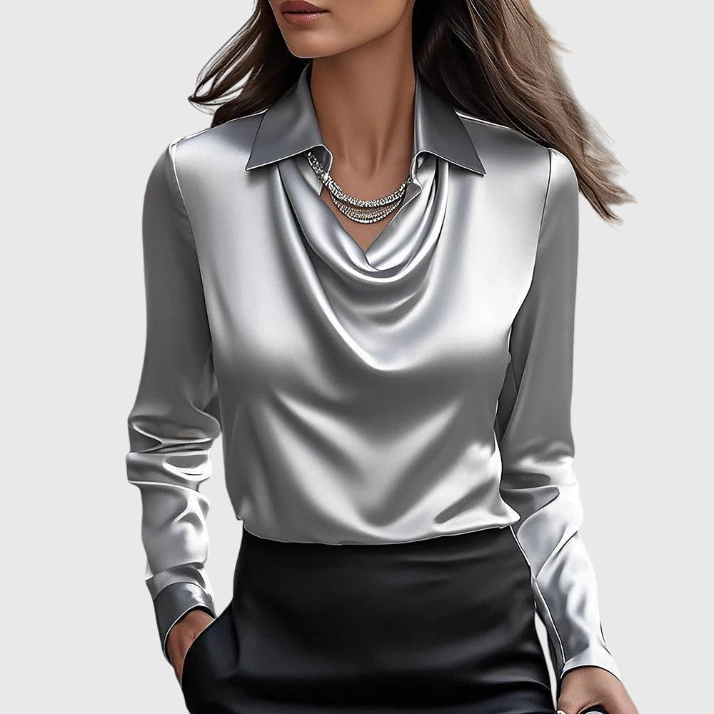 Blusa social feminina elegante, com decote cascata e conforto, disponível em cores variadas.
