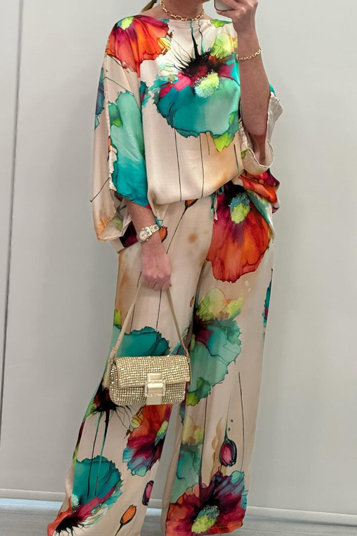 Conjunto Patricia feminino, estampado e vibrante. Roupa casual e elegante para a estação quente.
