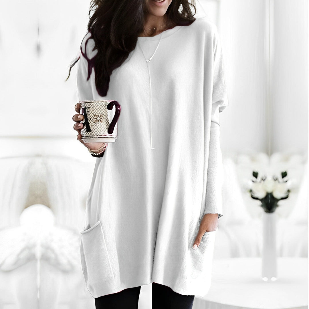 Top feminino de manga comprida, elegante e confortável, ideal para moda casual de inverno.