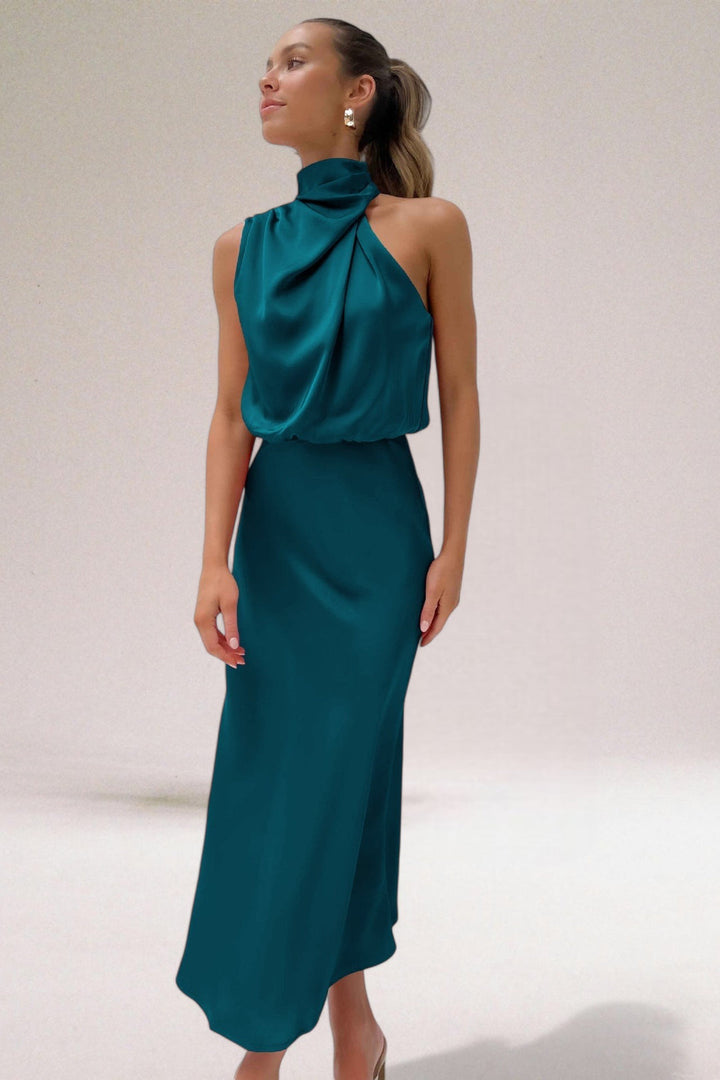 Vestido feminino halter longo elegante para moda festa, ideal para eventos especiais e noites vibrantes.