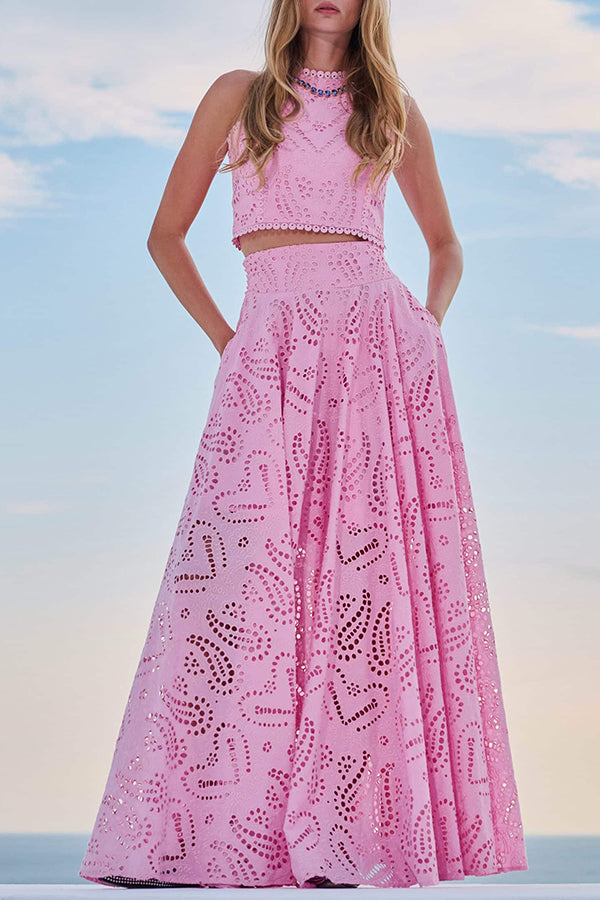 Conjunto feminino elegante com saia midi e top bordado, perfeito para eventos especiais.