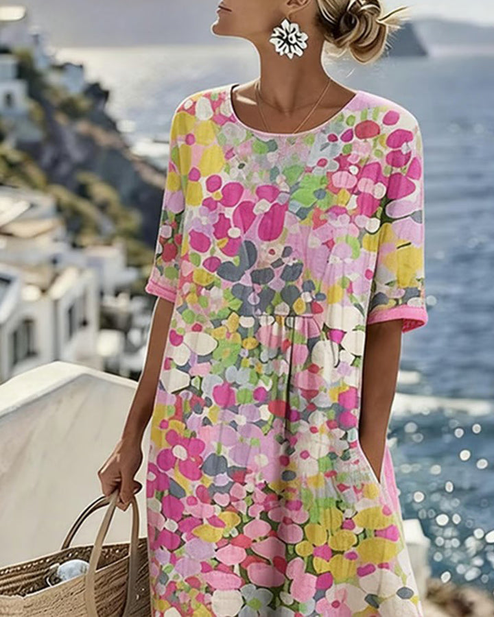 Vestido midi estampado floral, solto e leve, ideal para moda feminina de verão e primavera.