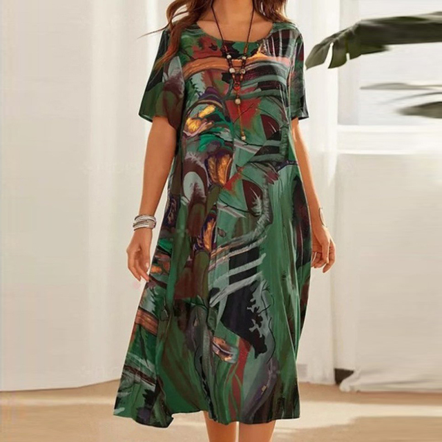 Vestido feminino confortável, estampa abstrata elegante para o verão. Maxi vestido casual, colorido e na moda.