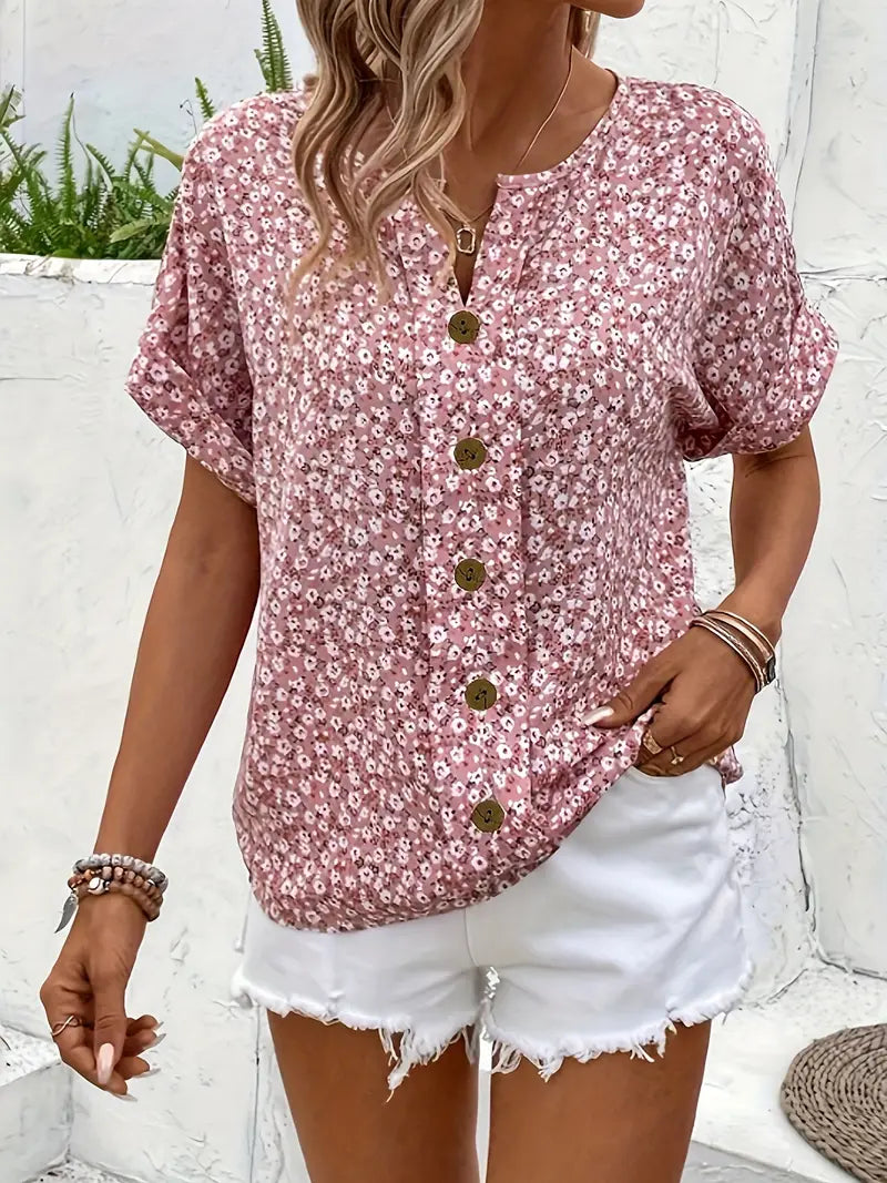Camisa feminina elegante com estampa floral, ótima para o verão e primavera. Peça versátil de moda feminina.