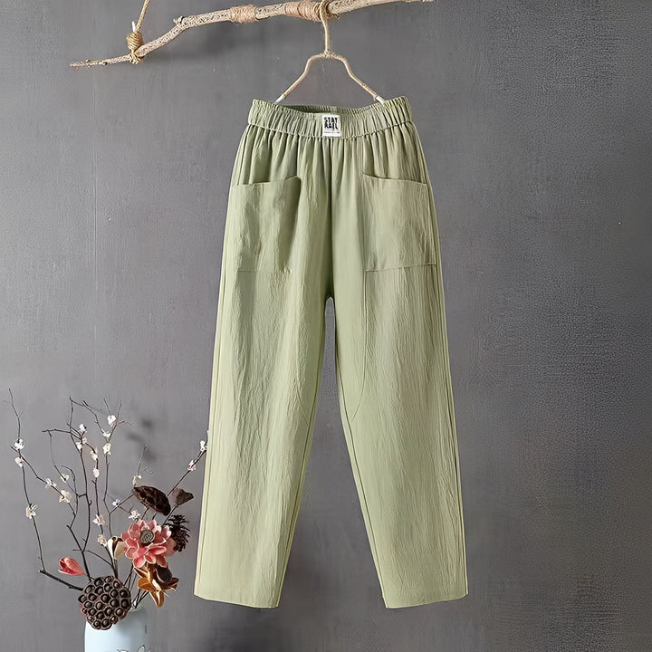 Calça feminina versátil com cintura elástica, perfeita para moda casual. Conforto e estilo para mulher moderna.