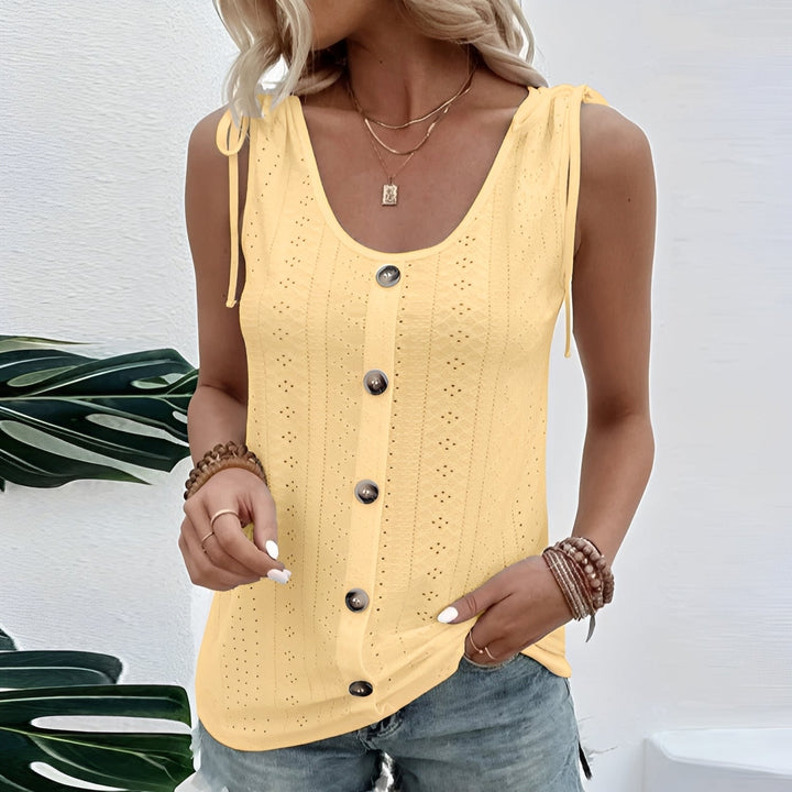 Top feminino de verão sem mangas. Regata casual para mulheres que buscam conforto e estilo no calor.