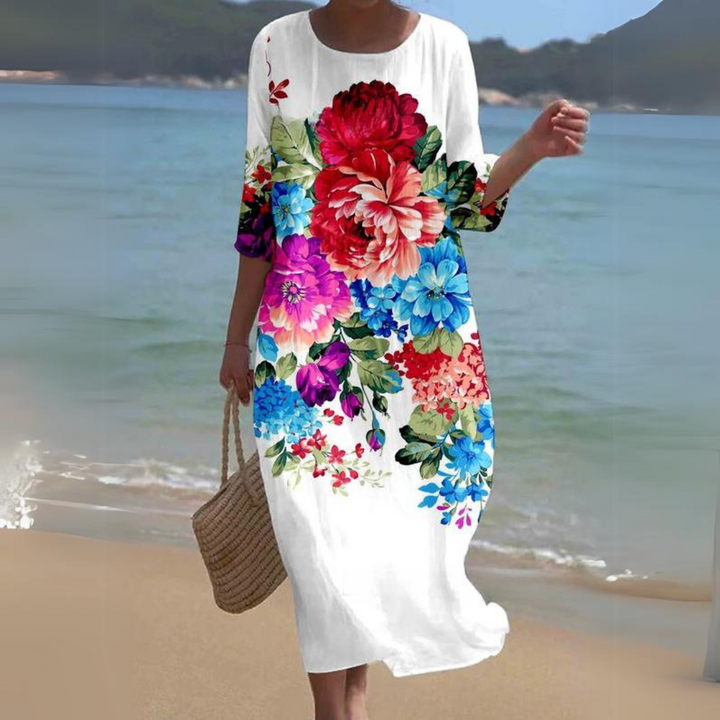 Vestido feminino midi, comprido e fluido. Elegância casual para dias quentes. Roupa confortável para ela.