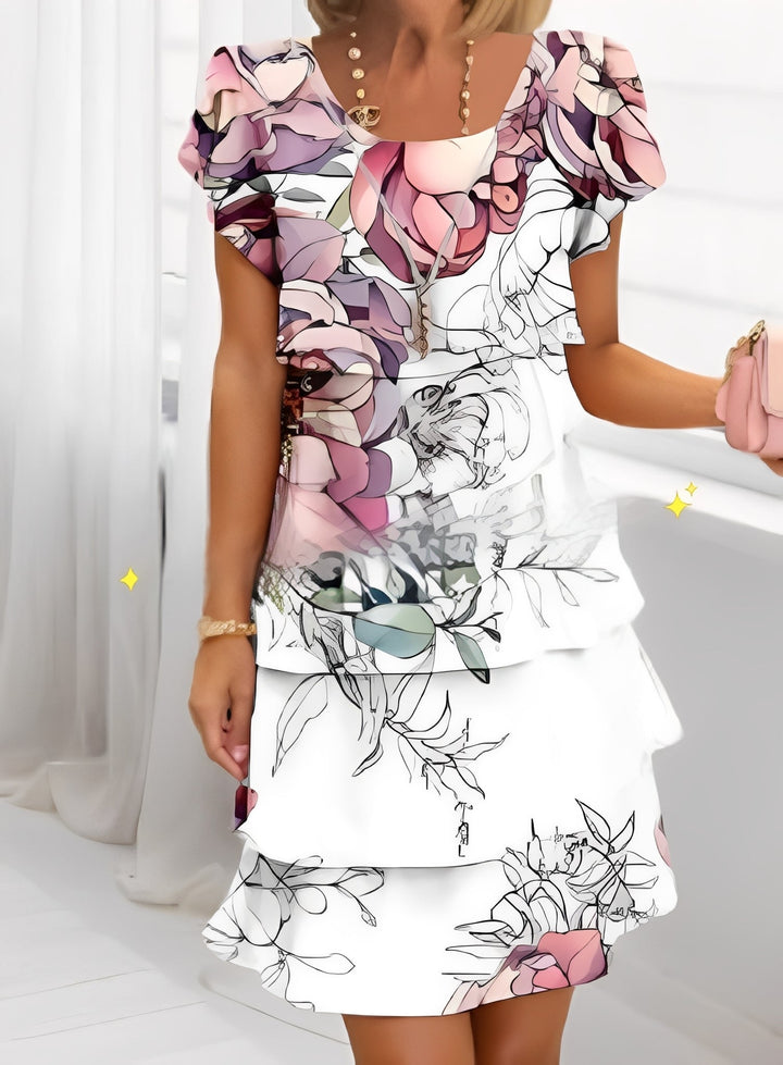 Vestido feminino de verão com babados e mangas curtas. Perfeito para um look casual chic e romântico.