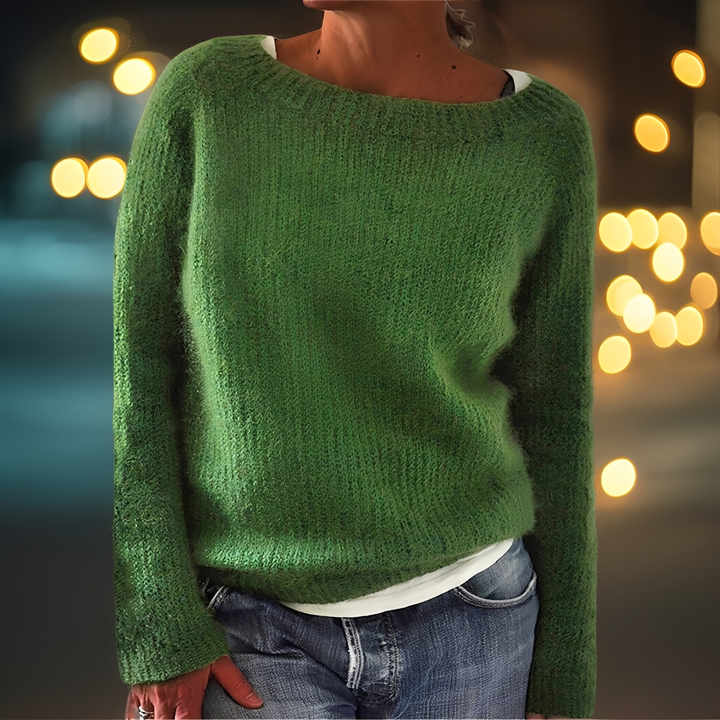 Suéter feminino de manga longa, folgado e confortável. Estilo aconchegante para os dias de outono e inverno.