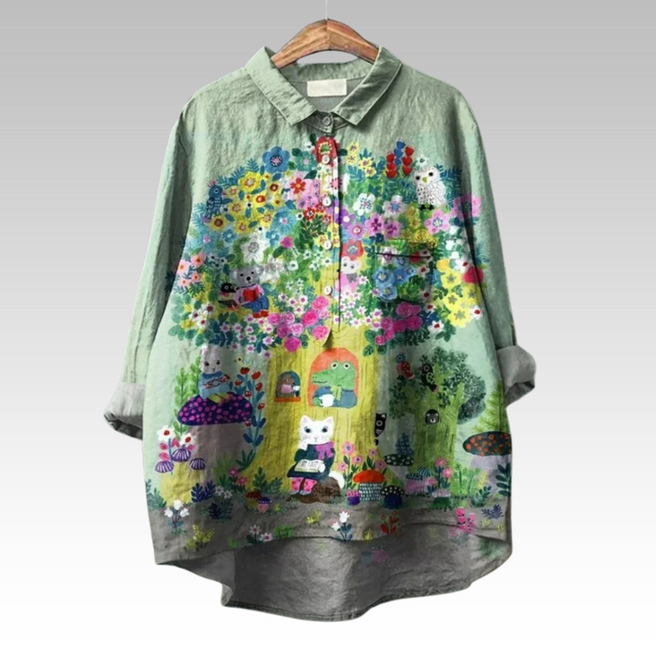 Blusa feminina floral clássica de manga longa, estampa vibrante, ideal para primavera/verão. Estilo casual e elegante.