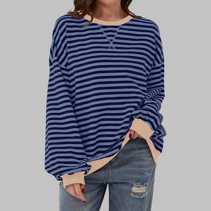 Camisola feminina Malin listrada, ideal para looks de outono/inverno, combinando moda e bem-estar.
