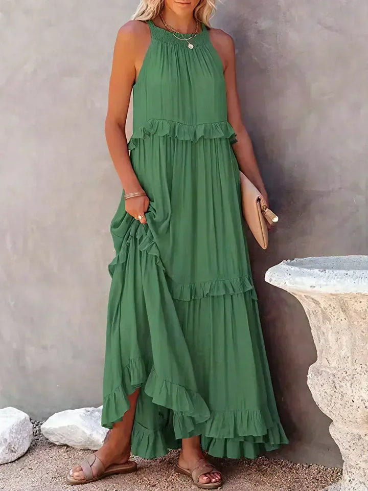Vestido longo feminino, alças finas e babados. Versátil para moda verão, festa ou dia a dia.