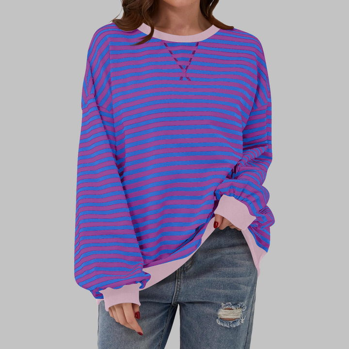 Desfrute o inverno com a camisola listrada feminina Malin, oferecendo calor, conforto e muito estilo.