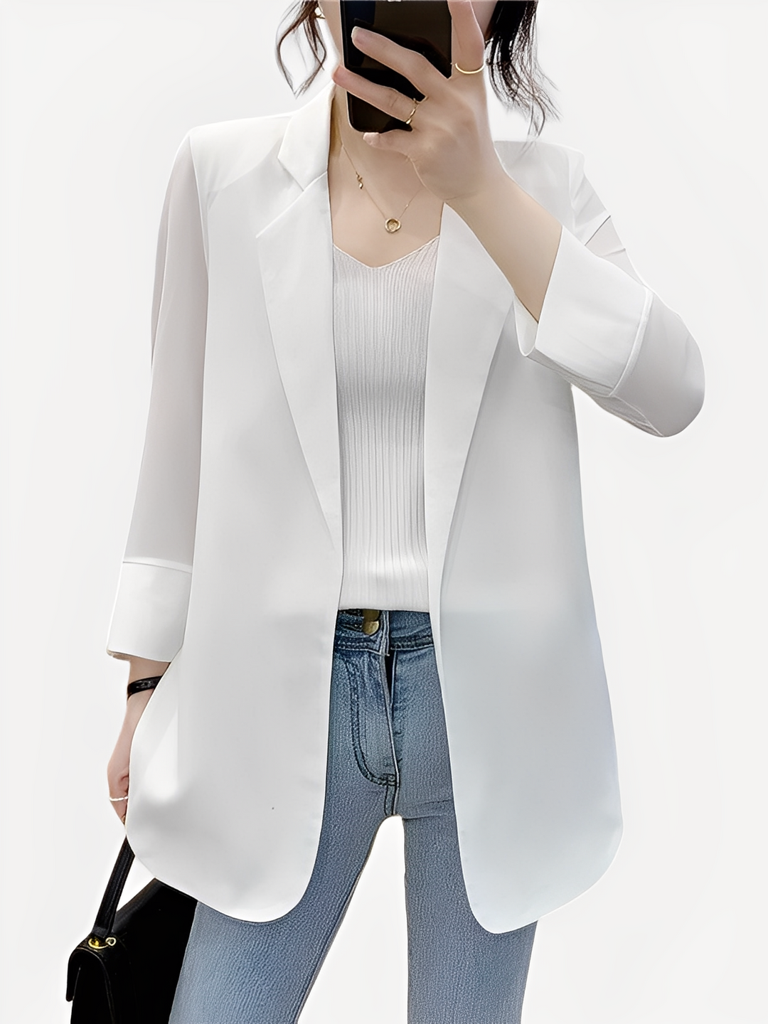 Blazer feminino cinza estruturado e versátil, para um estilo elegante, casual chic ou profissional.