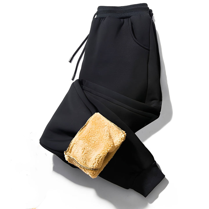 Calça masculina térmica que garante calor e conforto em dias frios, com corte reto casual e prático.