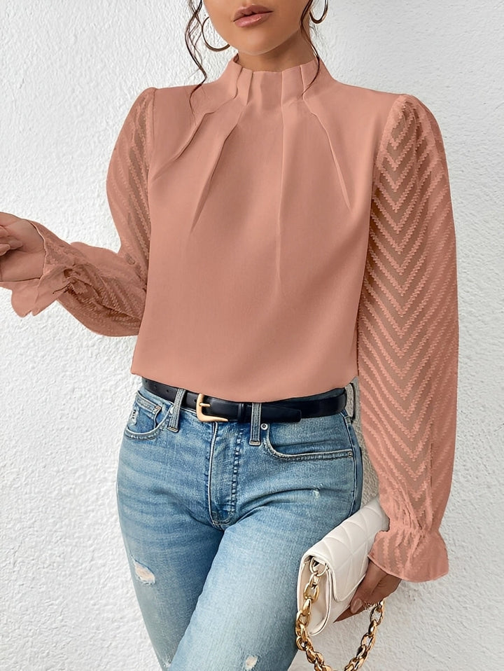 Top feminino de manga longa, blusa versátil para looks casuais e elegantes. Peça chave da moda feminina.