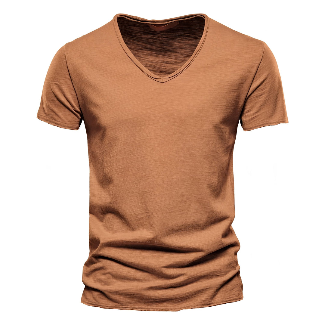 Camiseta feminina confortável com decote em V, disponível em várias cores, essencial para o seu estilo.
