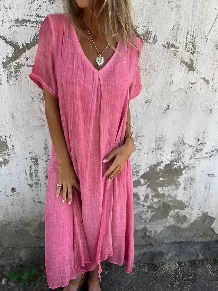 Vestido feminino midi solto e confortável, decote V, estilo casual elegante, perfeito para dias de verão.