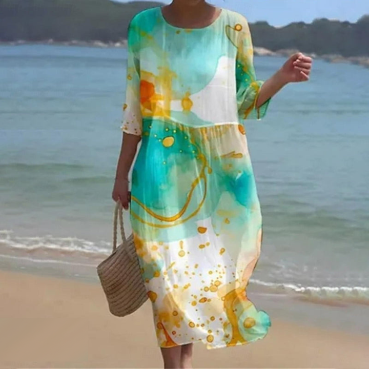 Vestido feminino midi fluido para o verão, perfeito para um look casual e elegante. Roupa confortável.