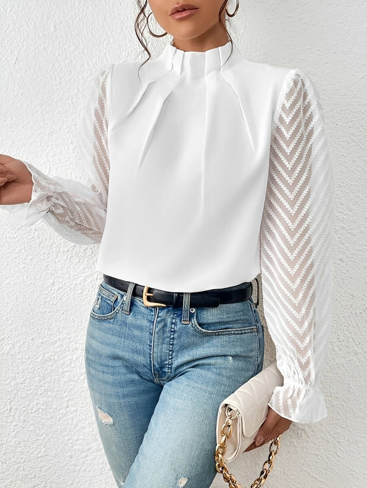 Blusa feminina de manga longa para um visual elegante. Top versátil para qualquer estação, casual chic.