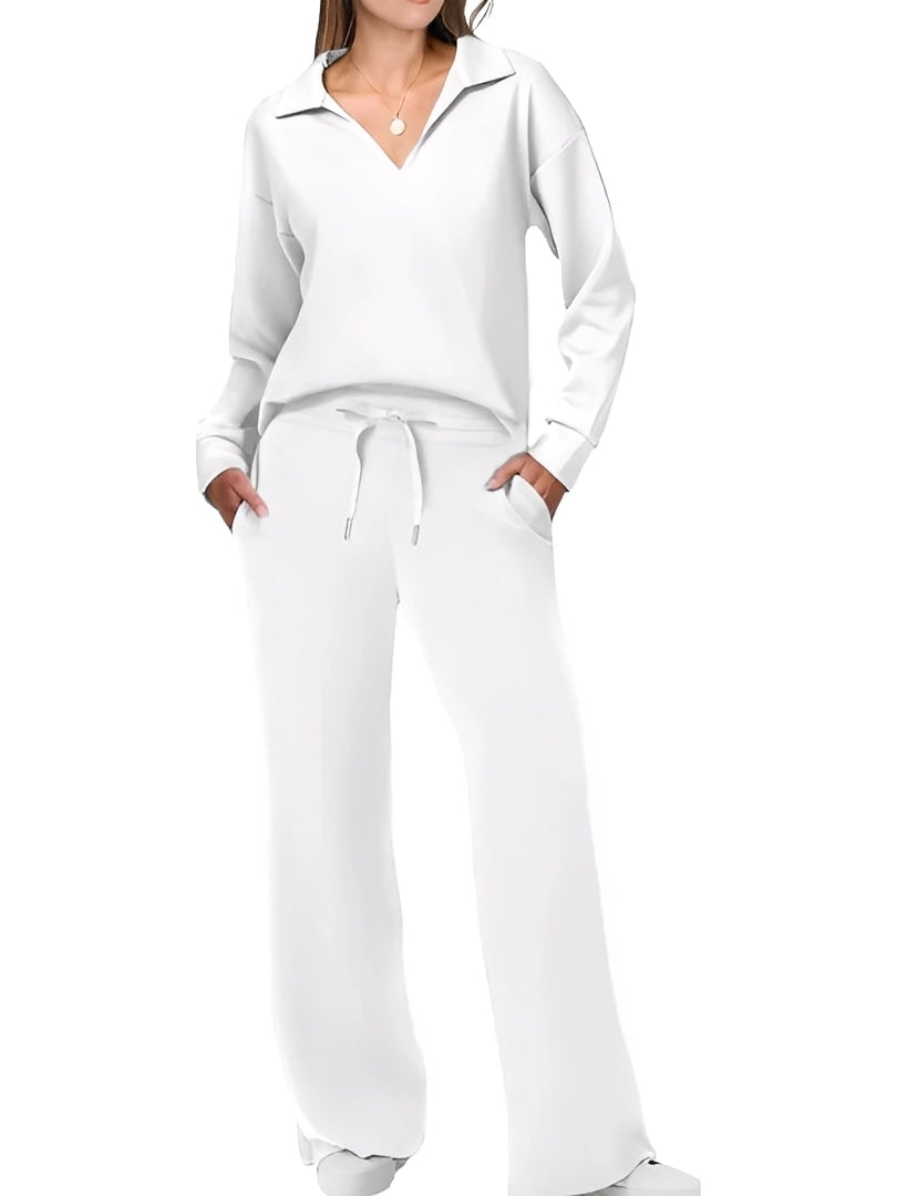 Conjunto feminino de suéter macio e calças casuais, ideal para conforto e estilo em momentos de lazer ou trabalho.