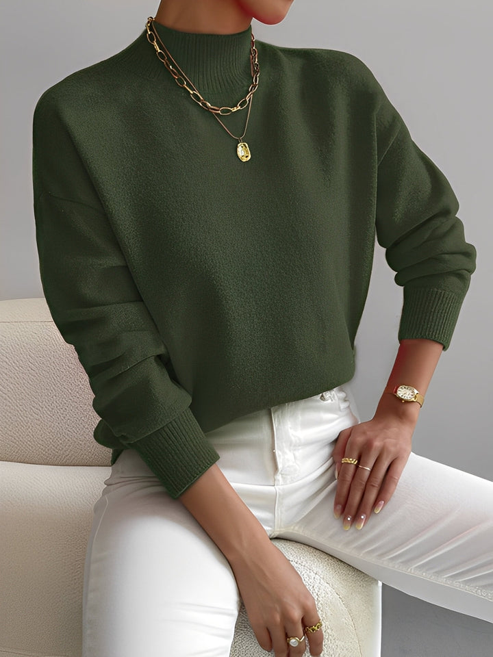 Elegante blusa feminina de gola alta, suéter macio e versátil que combina conforto com moda de inverno.