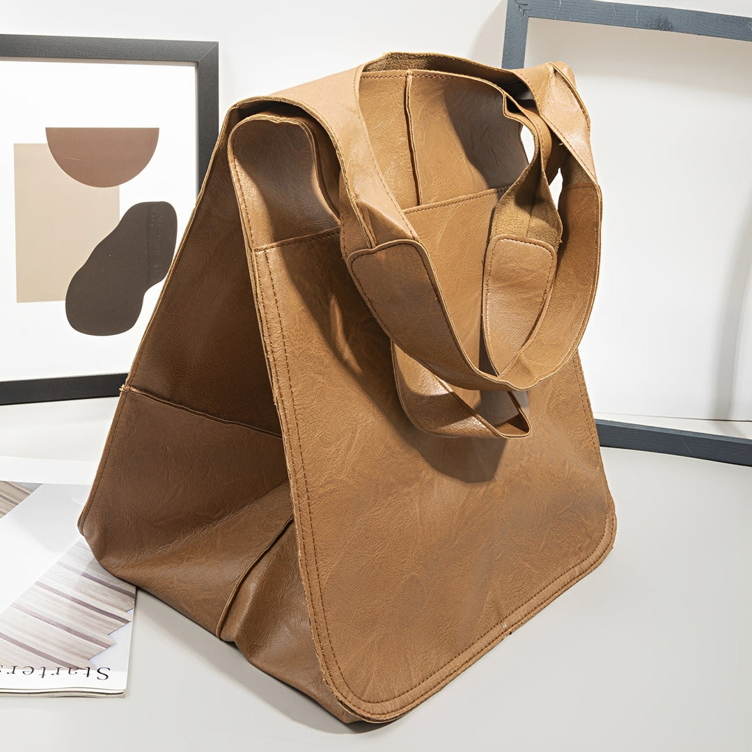 Bolsa de ombro feminina grande e clássica Davina, acessório elegante e versátil para o dia a dia.
