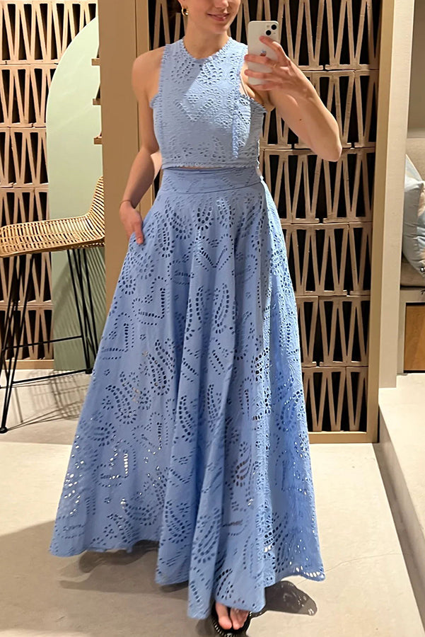 Conjunto feminino versátil com saia midi cintura alta e top bordado para diversas ocasiões.