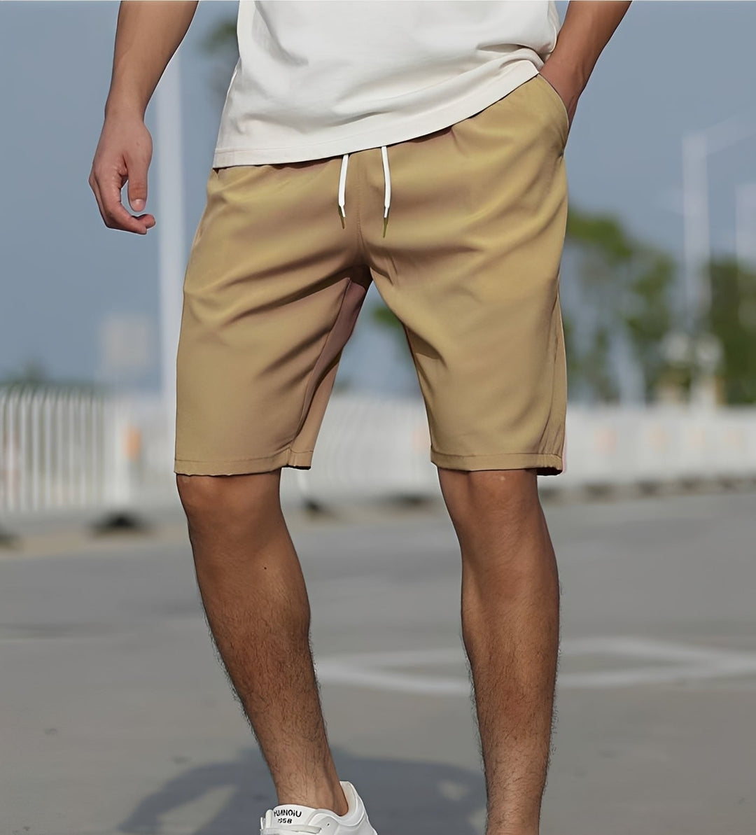Calções masculinos para o verão, perfeitos para moda praia ou roupa de lazer, com cordão para ajuste.
