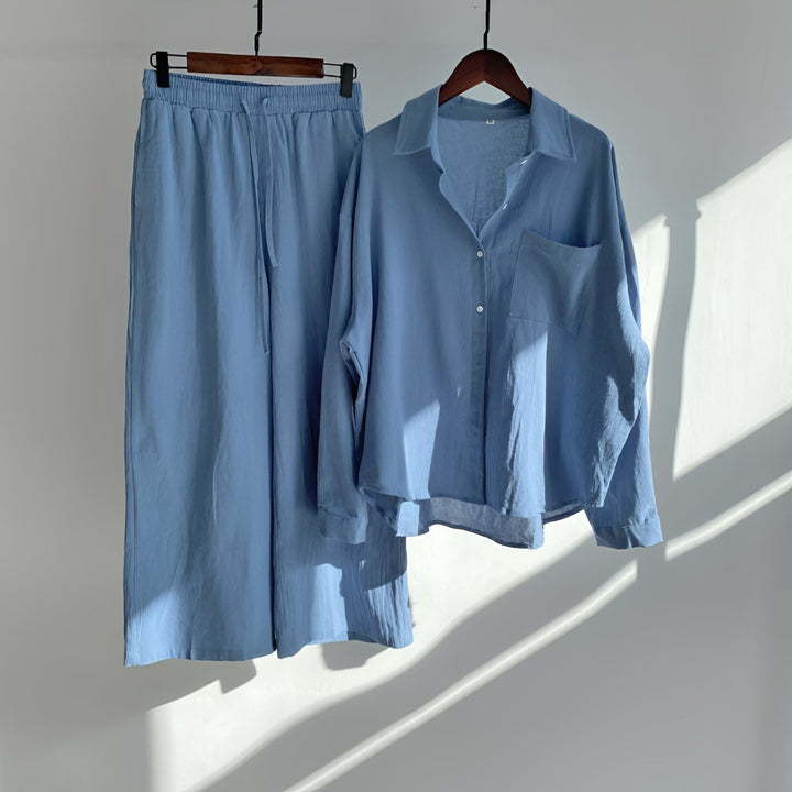 Conjunto de duas peças feminino, folgado e confortável, ideal para o verão e férias.