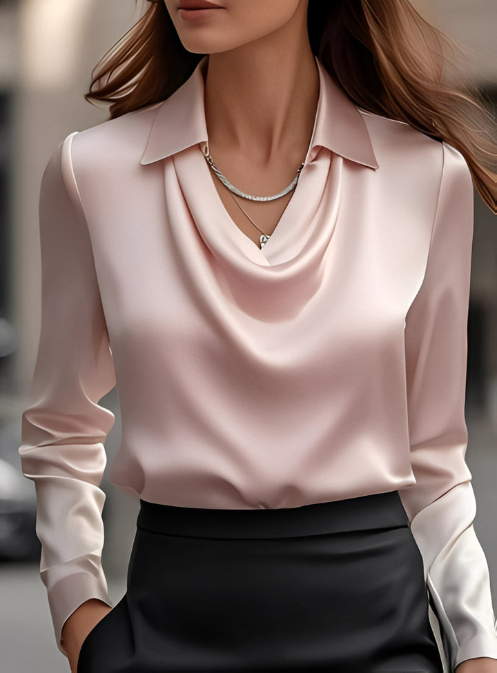 Blusa feminina formal elegante com pregas e manga longa. Perfeita para escritório e eventos sociais.