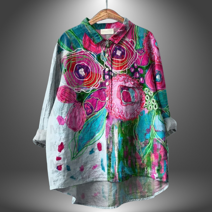 Roupa feminina: Camisa floral artesanal com cores vibrantes. Estilo único para looks de primavera-verão.