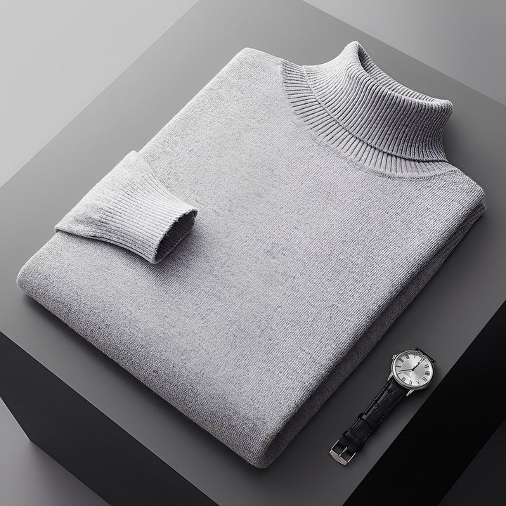 Homem usando suéter masculino de gola alta, look elegante e confortável para o inverno.