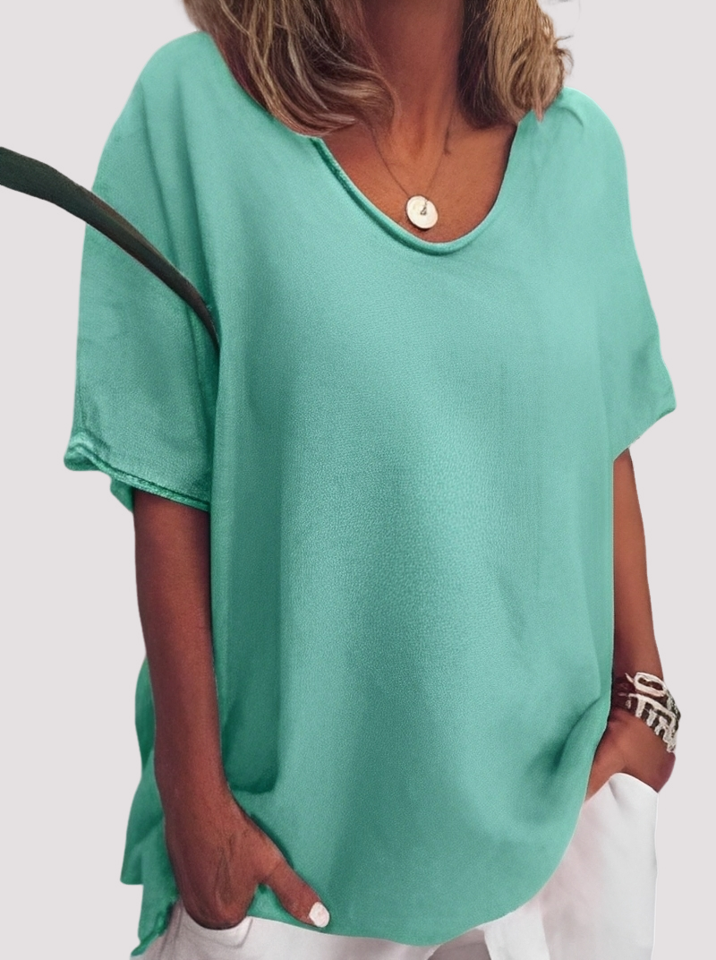 Blusa feminina solta casual para o dia a dia. Confortável e estilosa, ideal para o verão.