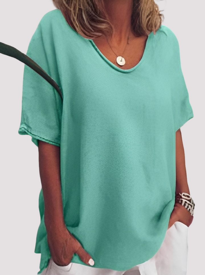 Blusa feminina solta casual para o dia a dia. Confortável e estilosa, ideal para o verão.