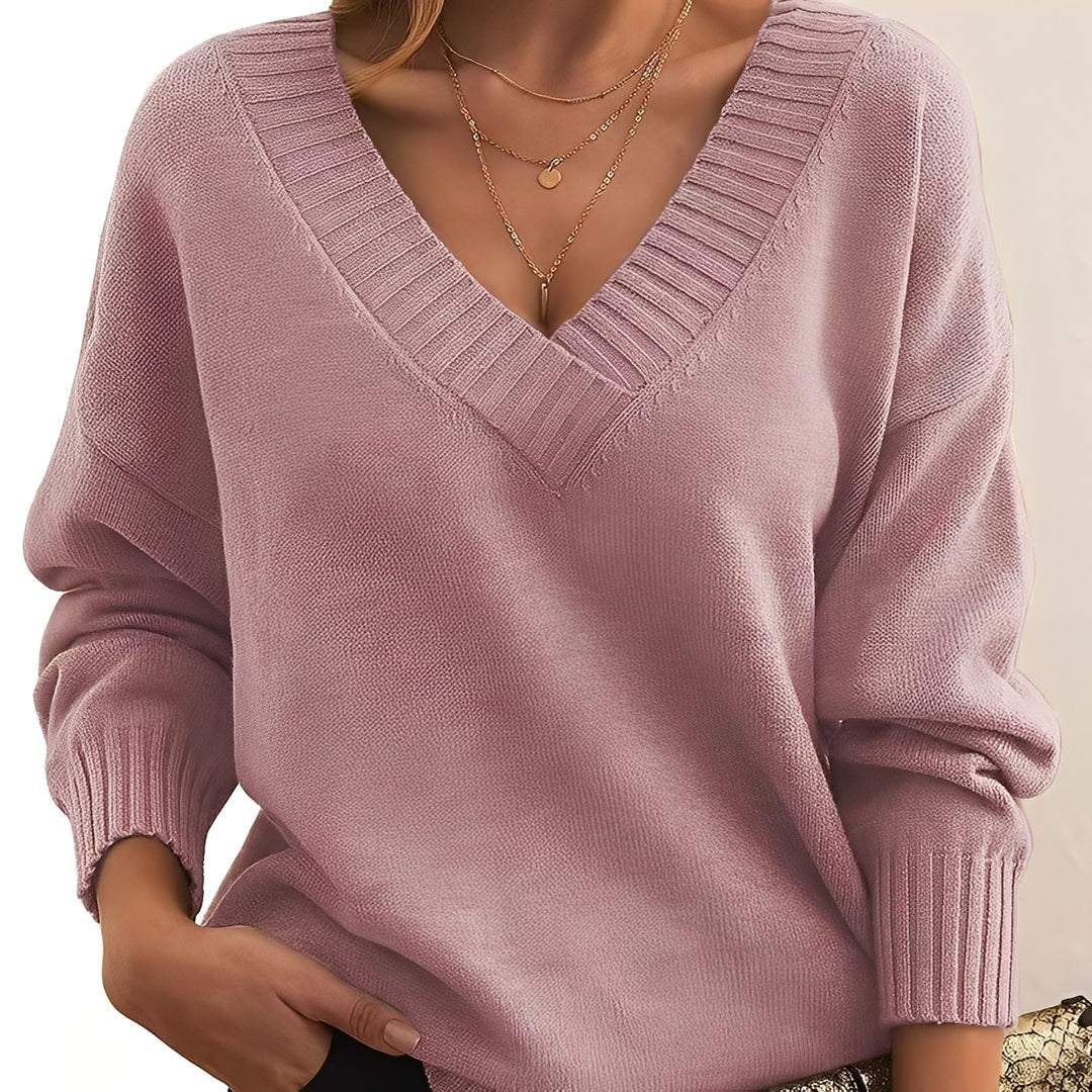 Agasalho feminino de tricô fino, pulôver elegante que oferece calor e estilo no inverno.