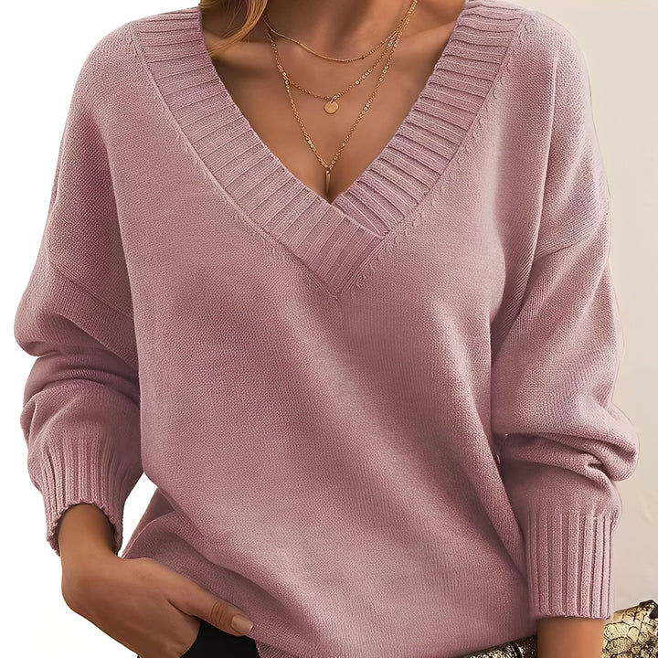 Agasalho feminino de tricô fino, pulôver elegante que oferece calor e estilo no inverno.