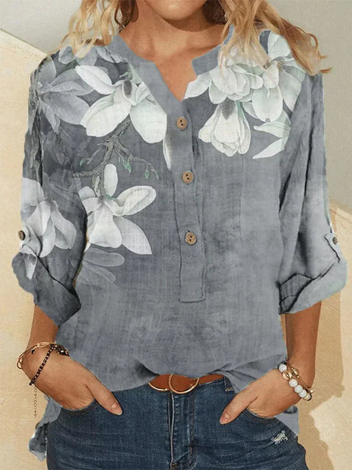 Moda feminina: Camisa de gola alta com bordado floral delicado. Estilo elegante e versátil para suas roupas.