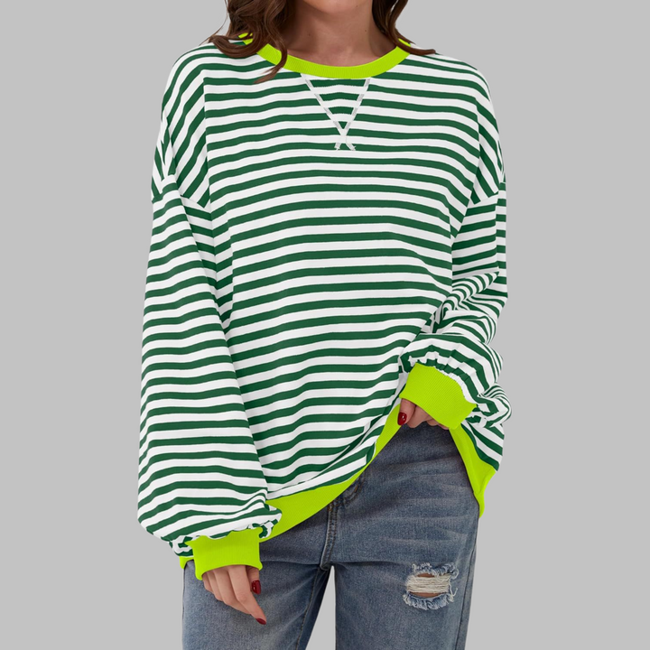 Adicione estilo ao seu guarda-roupa com a camisola listrada Malin, uma peça feminina e aconchegante.