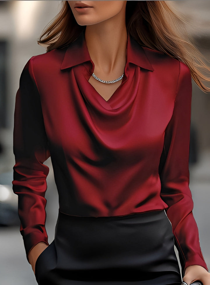 Blusa feminina manga longa com pregas, toque elegante. Ideal para moda executiva e eventos sofisticados.