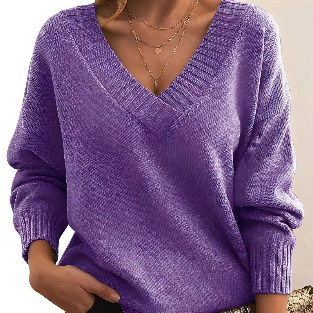 Pulôver feminino moderno, camisola de inverno elegante para um visual contemporâneo.