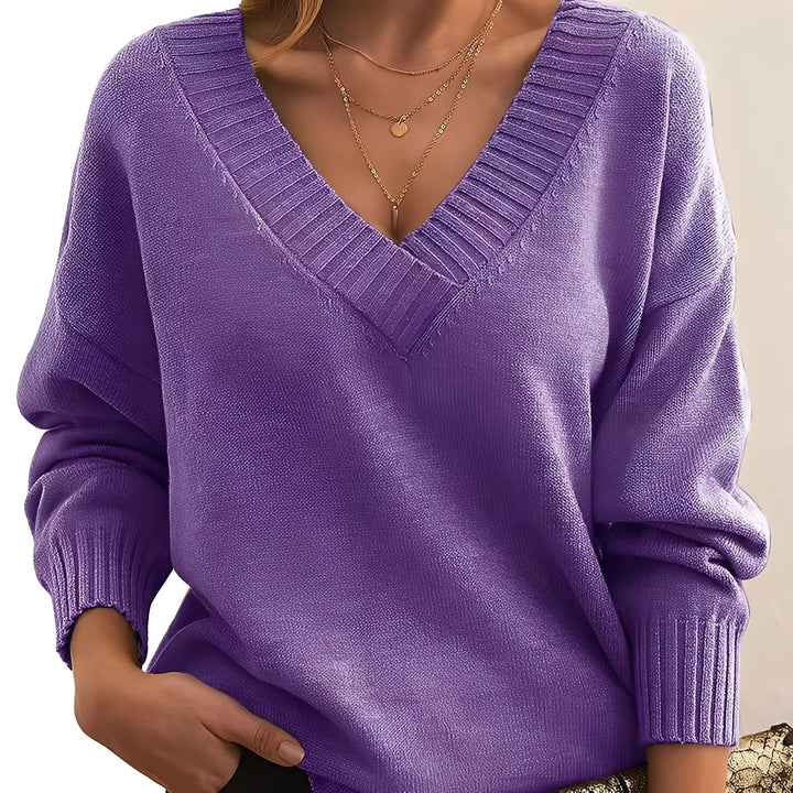 Pulôver feminino moderno, camisola de inverno elegante para um visual contemporâneo.