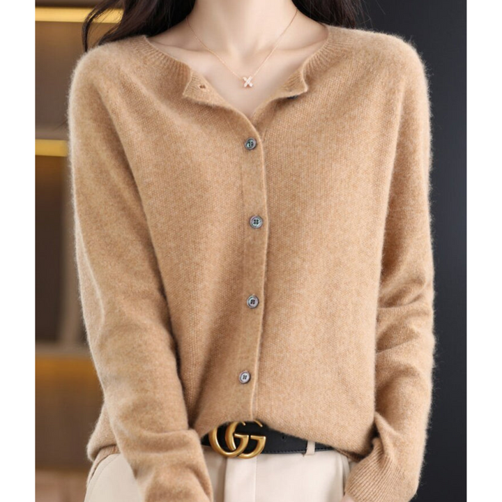 Confortável suéter feminino de malha. Gola redonda, manga comprida, elegante para inverno e dia a dia.