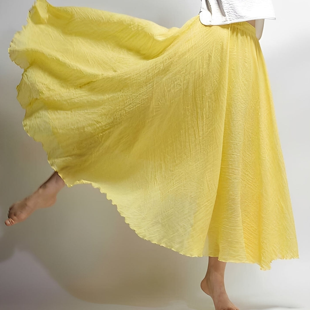 Saia feminina maxi fluida boêmia, tecido leve e confortável. Perfeita para looks casuais de verão e praia.