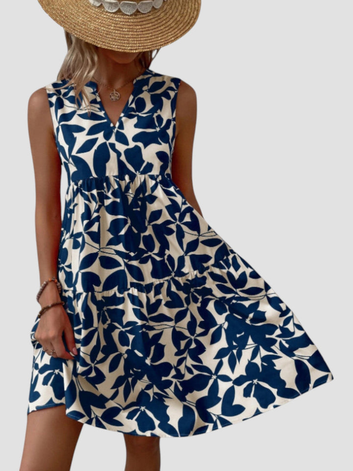 Vestido midi feminino, estampa de folhas, para o verão. Conforto, leveza e elegância em uma única peça.