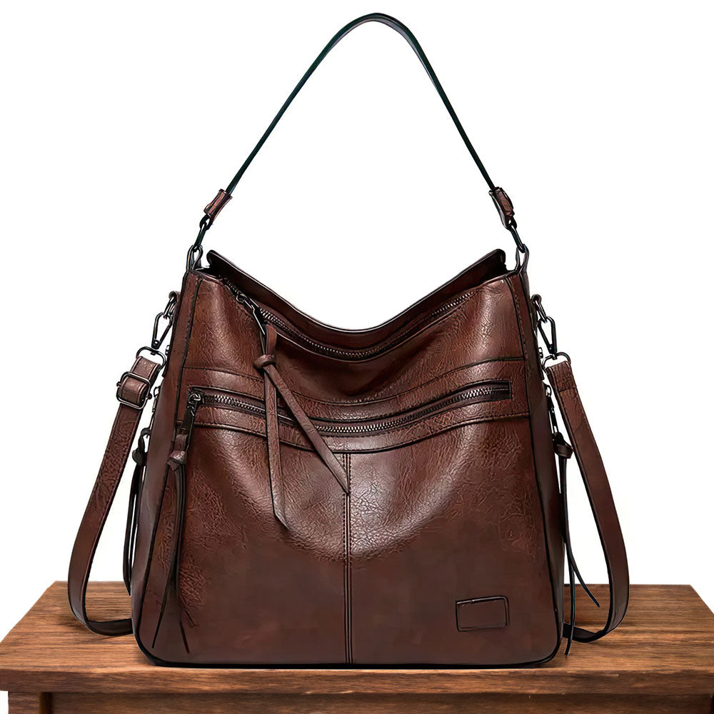 Bolsa feminina de couro luxuosa, para todas as ocasiões. Acessório elegante e sofisticado em couro genuíno.