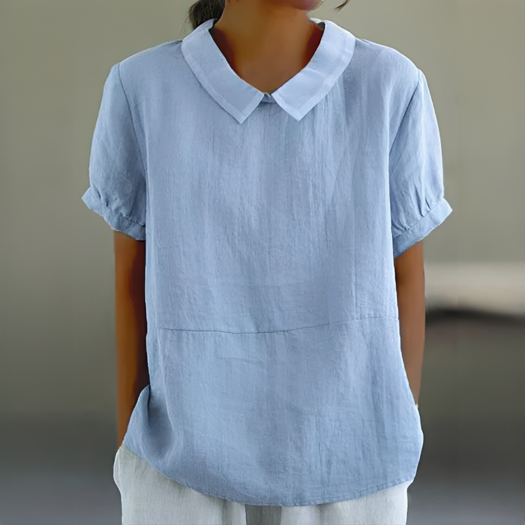 Camisa feminina elegante para verão. Blusa fresca e confortável, ideal para moda feminina casual ou sofisticada.
