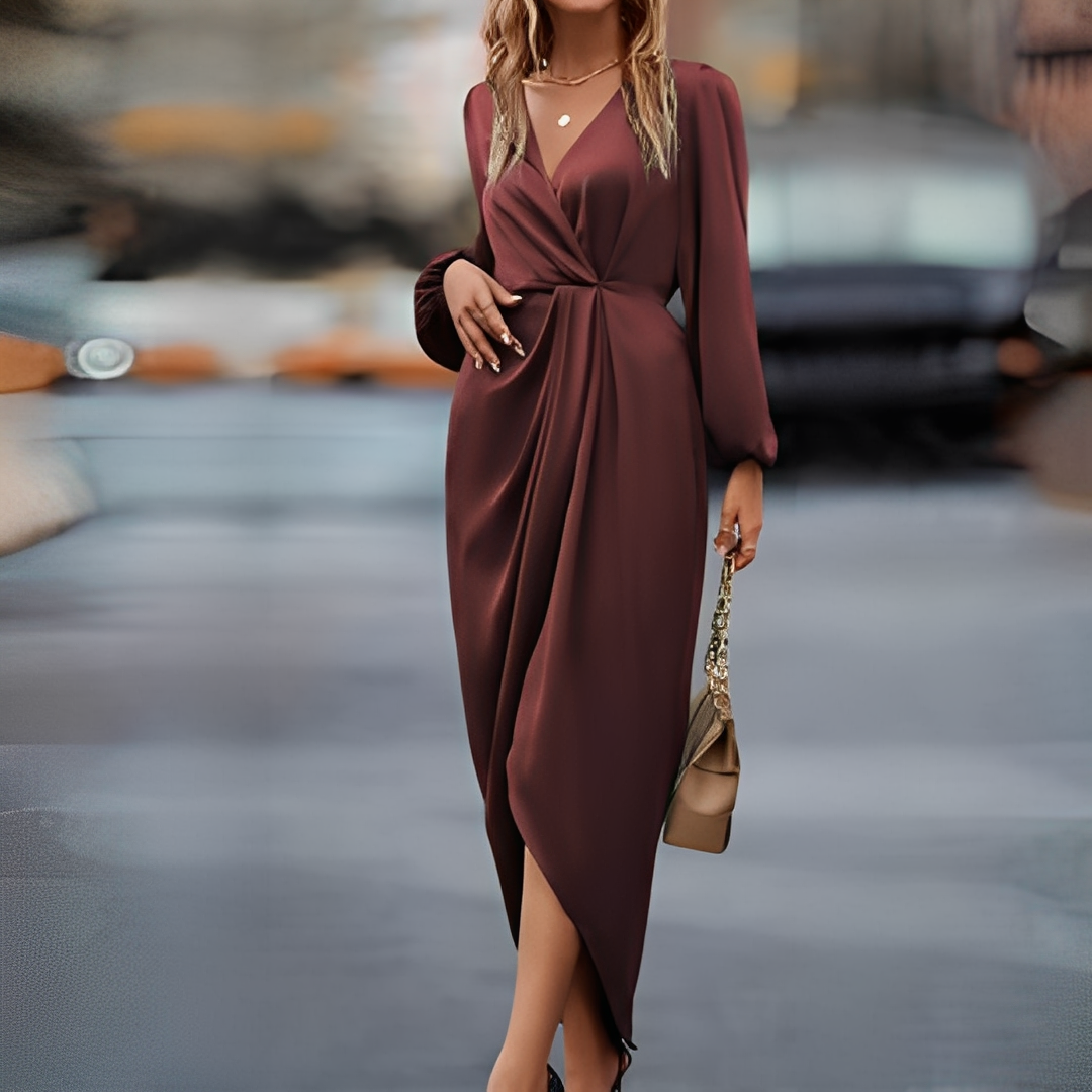 Vestido midi feminino vermelho com mangas longas, perfeito para festas e ocasiões especiais. Look elegante e moderno.