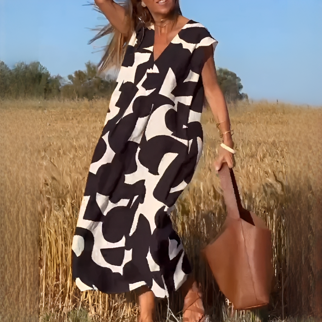 Vestido feminino elegante decote V, corte solto e confortável para verão. Estilo casual e moderno.